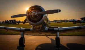 military plane parked on runway